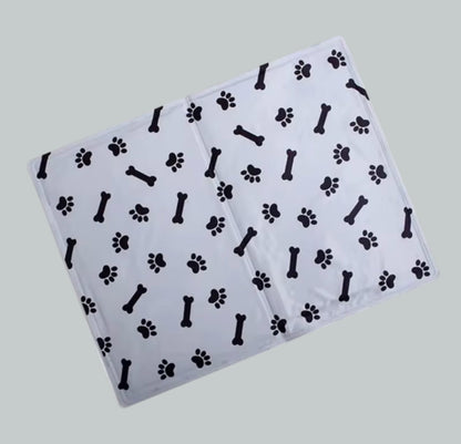 Pawfectly Cool pet cooling mat for dogs and cats

Blue self-cooling gel mat for pets on hardwood floor

Small dog lying on Pawfectly Cool pet cooling pad

Portable pet cooling mat for summer travel